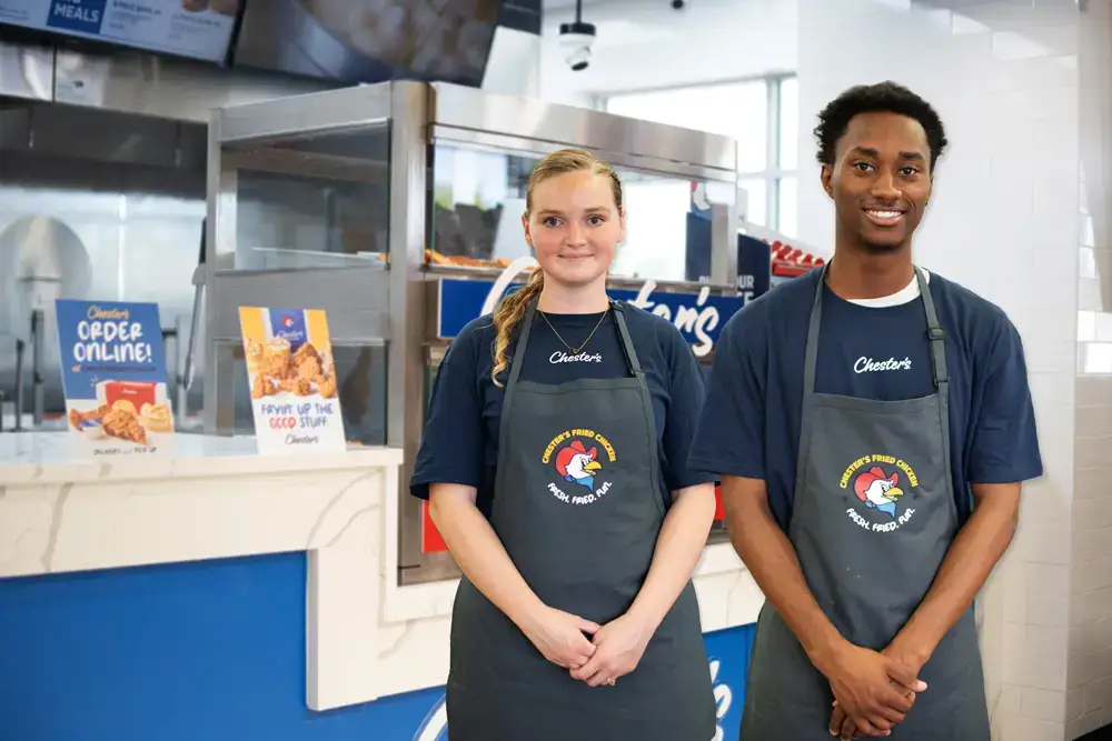 chesters employees in front of counter